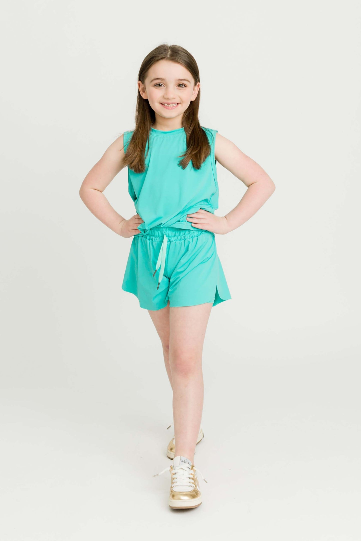 Kids teal butterfly shorts side view