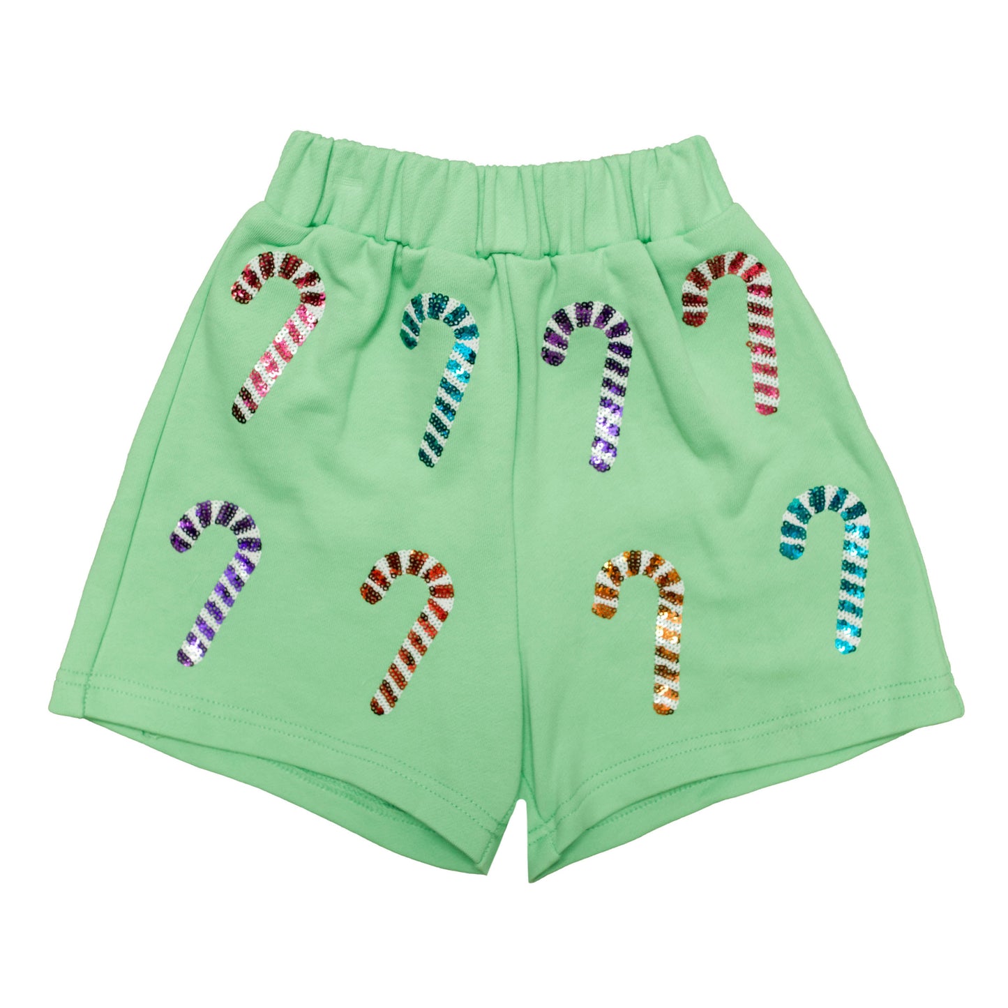 Green shorts with candy cane designs on a white background