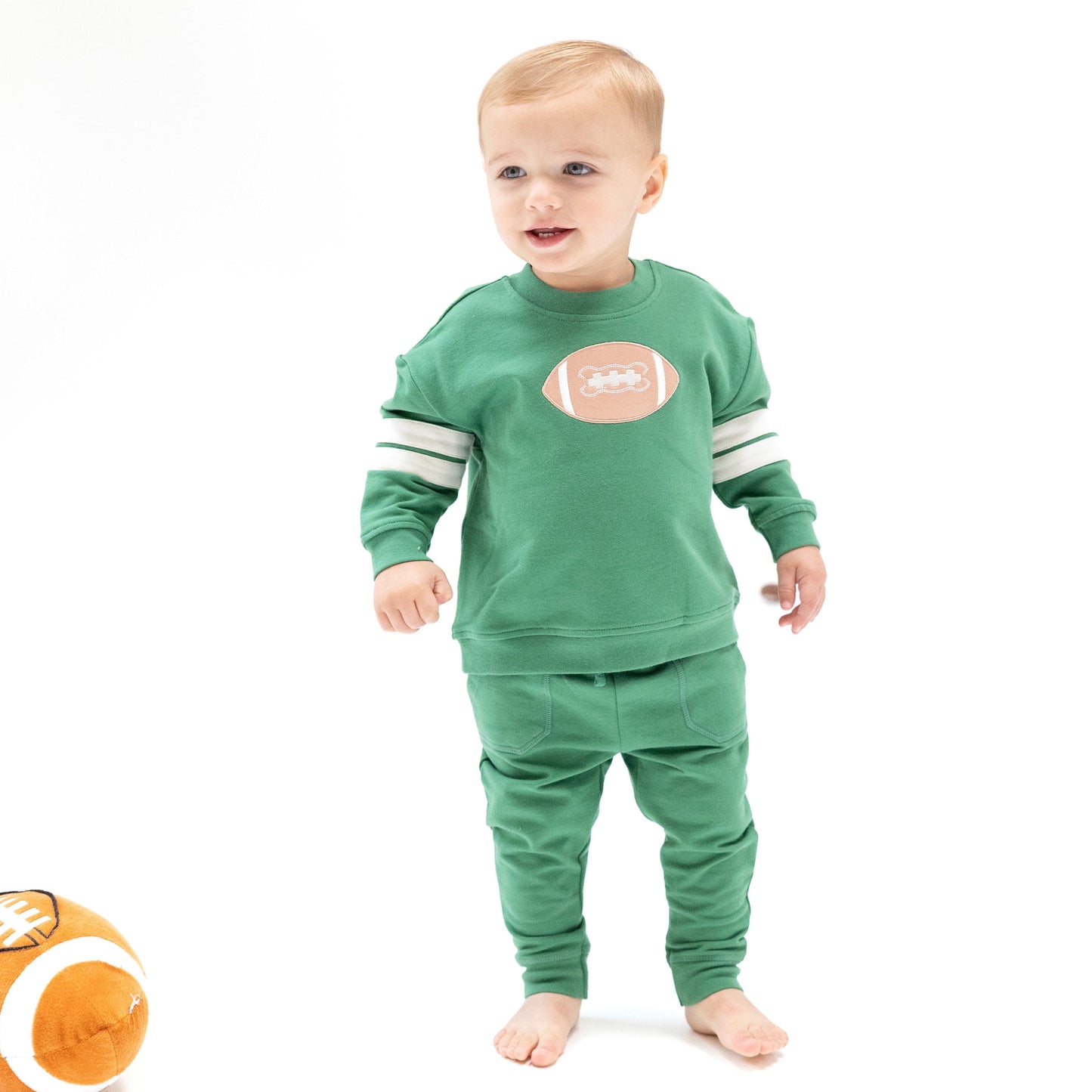 Varsity green cozy drop sleeve sweatshirt with varsity stripes front view