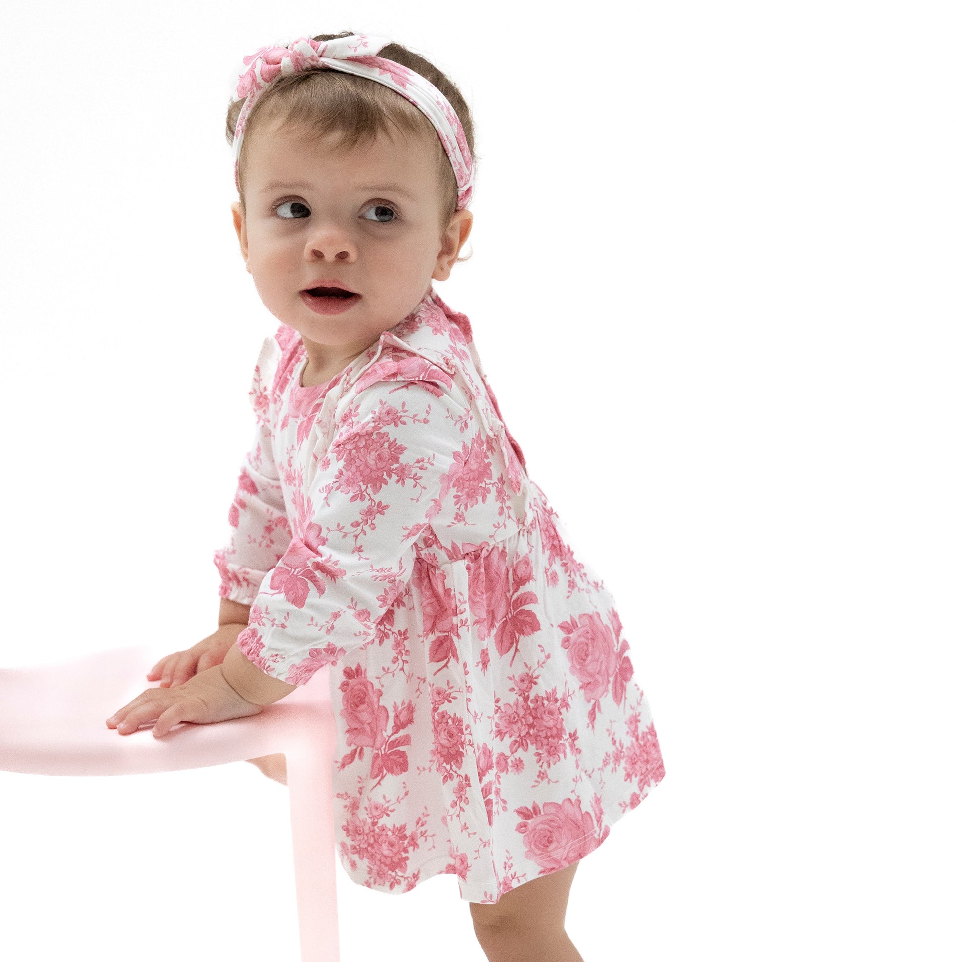 Vintage pink roses ruffle long sleeve bodysuit dress front view