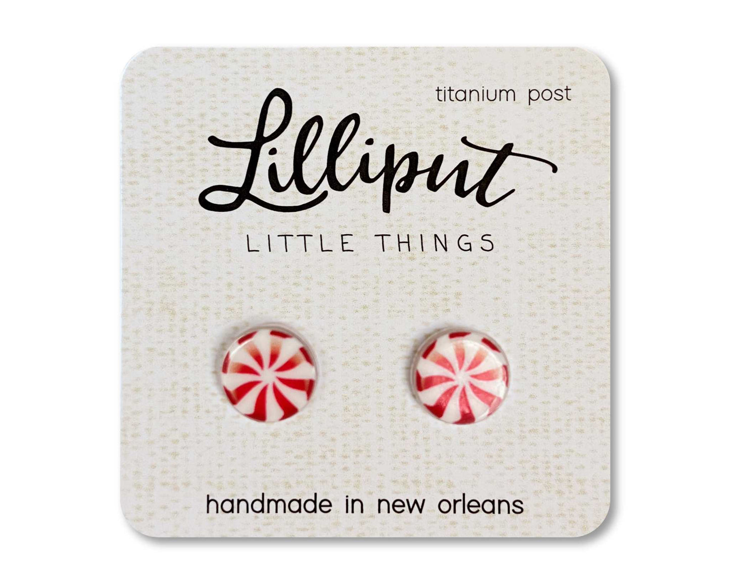 Lilliput Little Things peppermint stud earrings with hypoallergenic titanium posts on a branded card, handmade in New Orleans