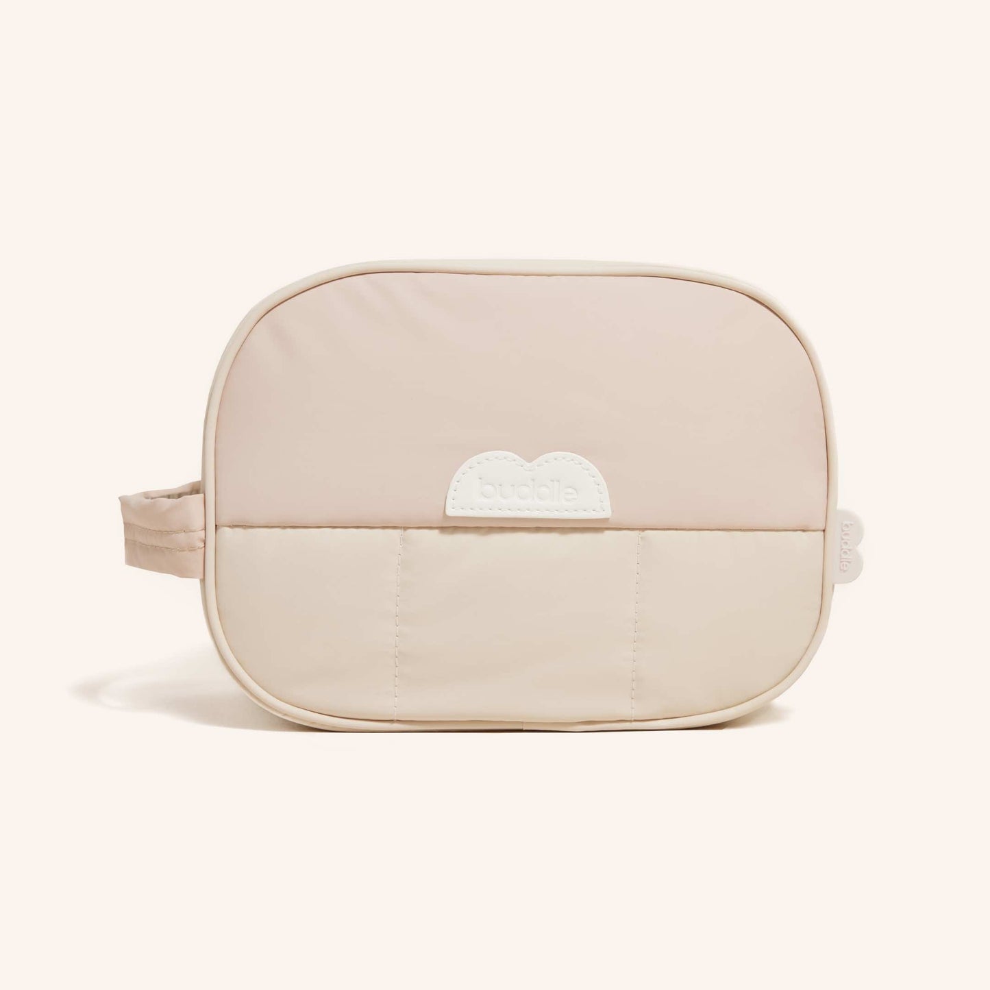Buddle Bum Bag beige baby diaper changing bag with zippered top and side handle, compact and easy to wipe down.