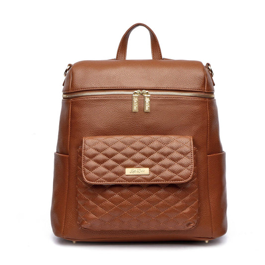 Monaco Diaper Bag in Caramel Brown with quilted front pocket, premium vegan leather, and dual carrying options.
