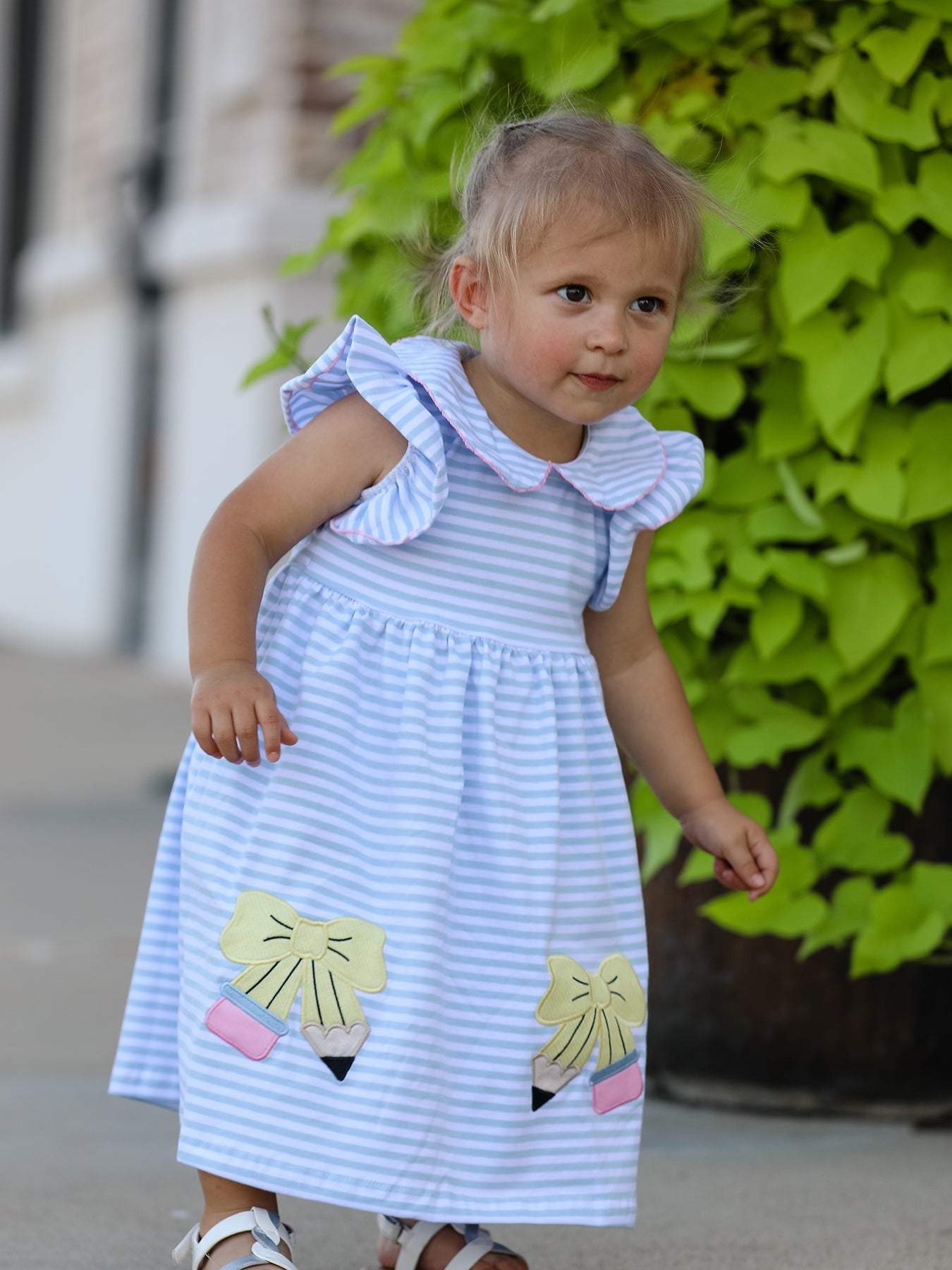 Back to school girls stripe dress, side view