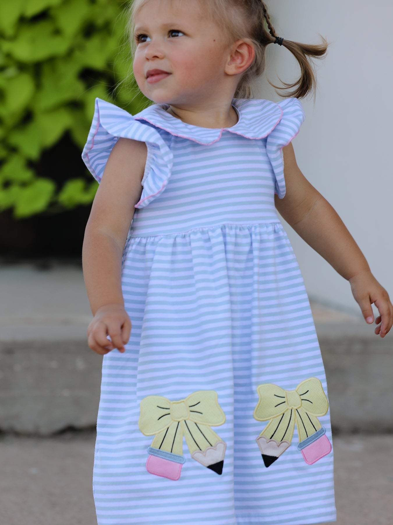 Pencil appliqué detail on back to school girls dress