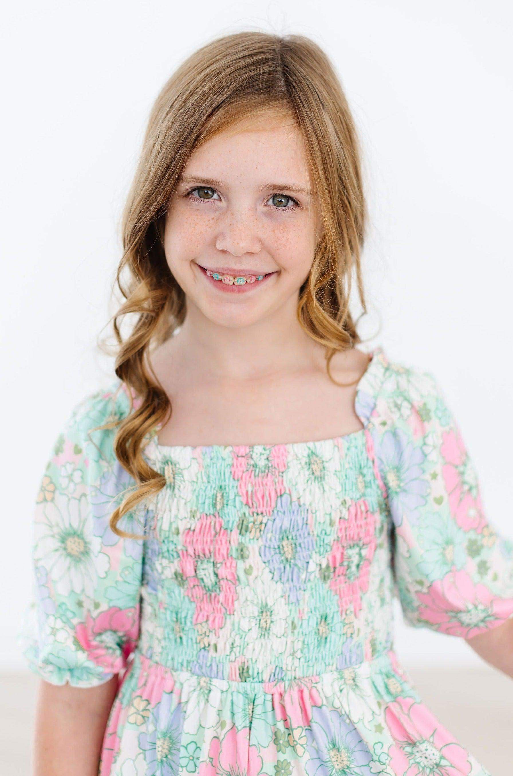 Minty Meadow Smocked Ruffle Dress fabric and material close-up