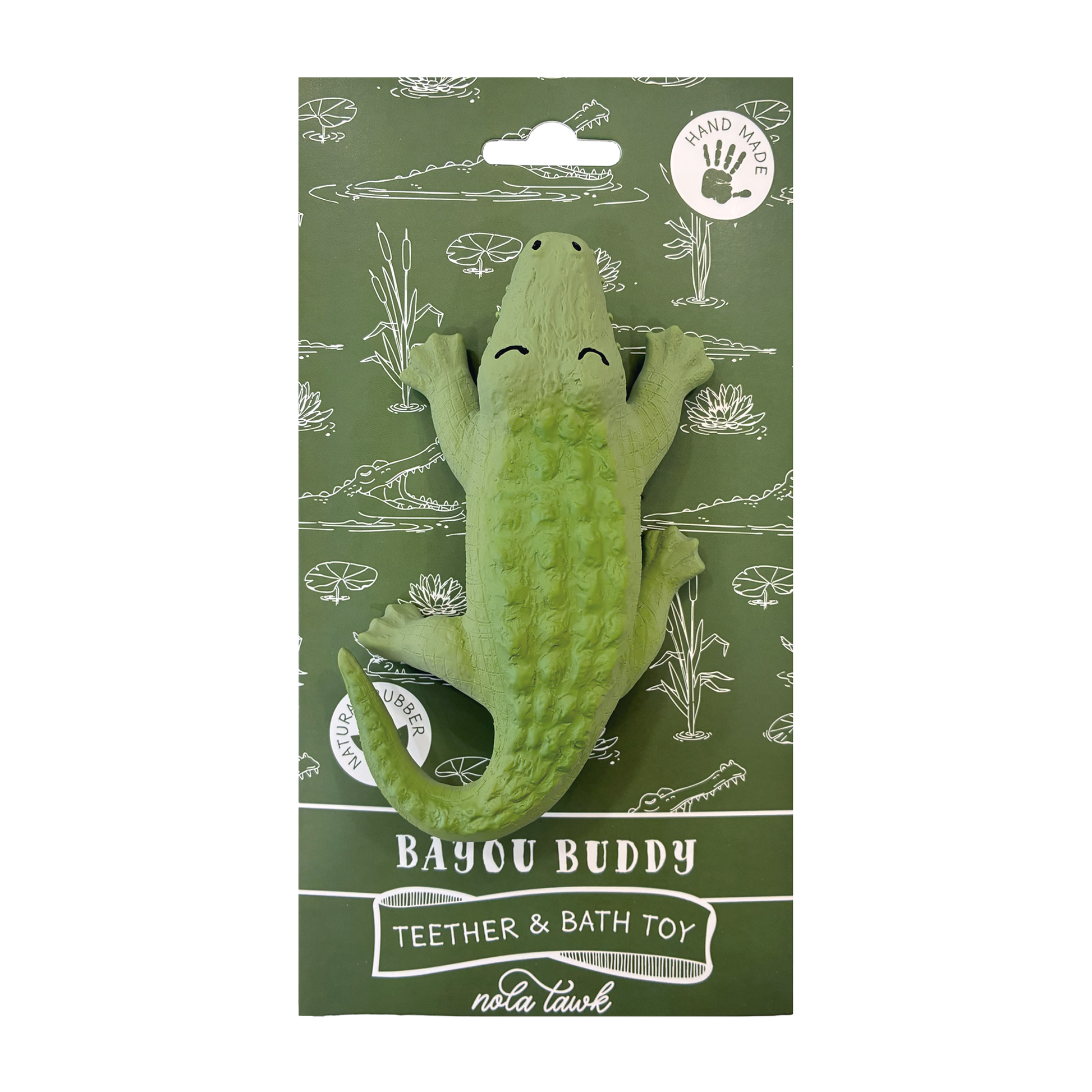 Green alligator toy with packaging on a white background