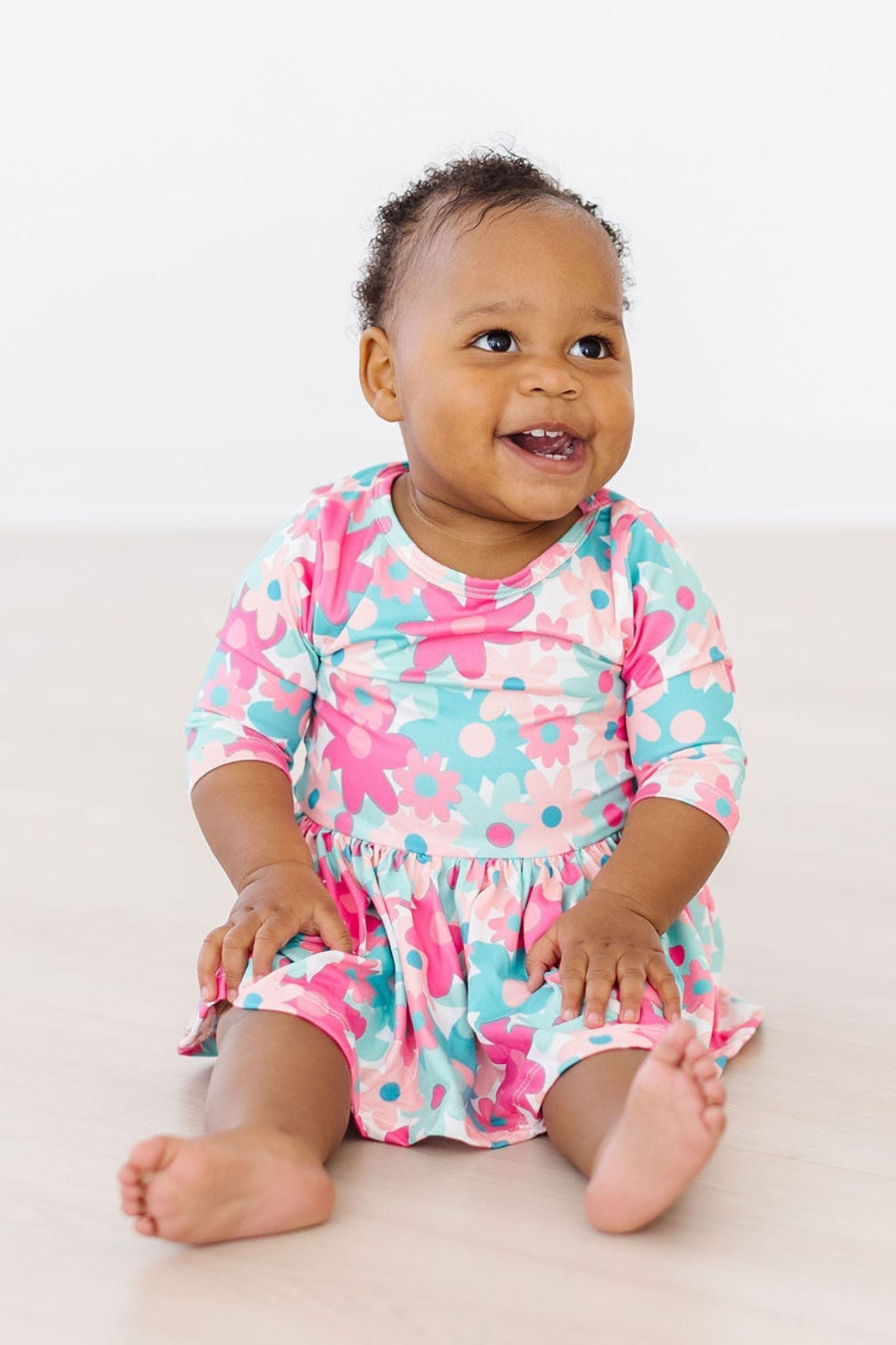Petal Perfection 3/4 Sleeve Twirl Bodysuit