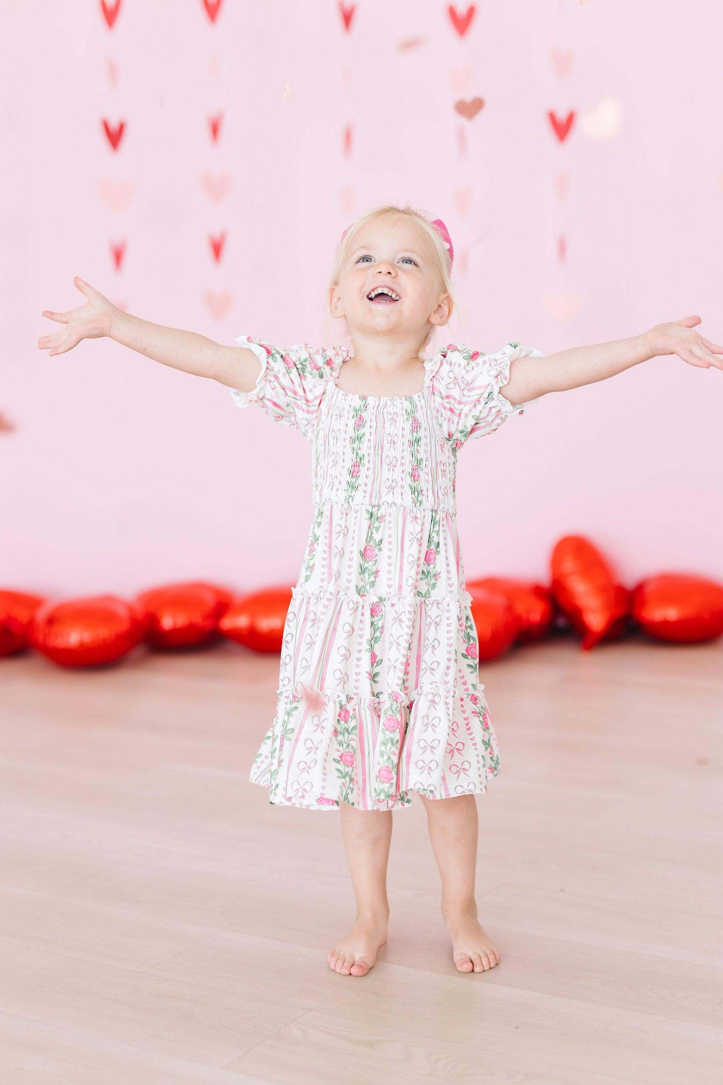Rosebud Bows Smocked Ruffle Dress full length view