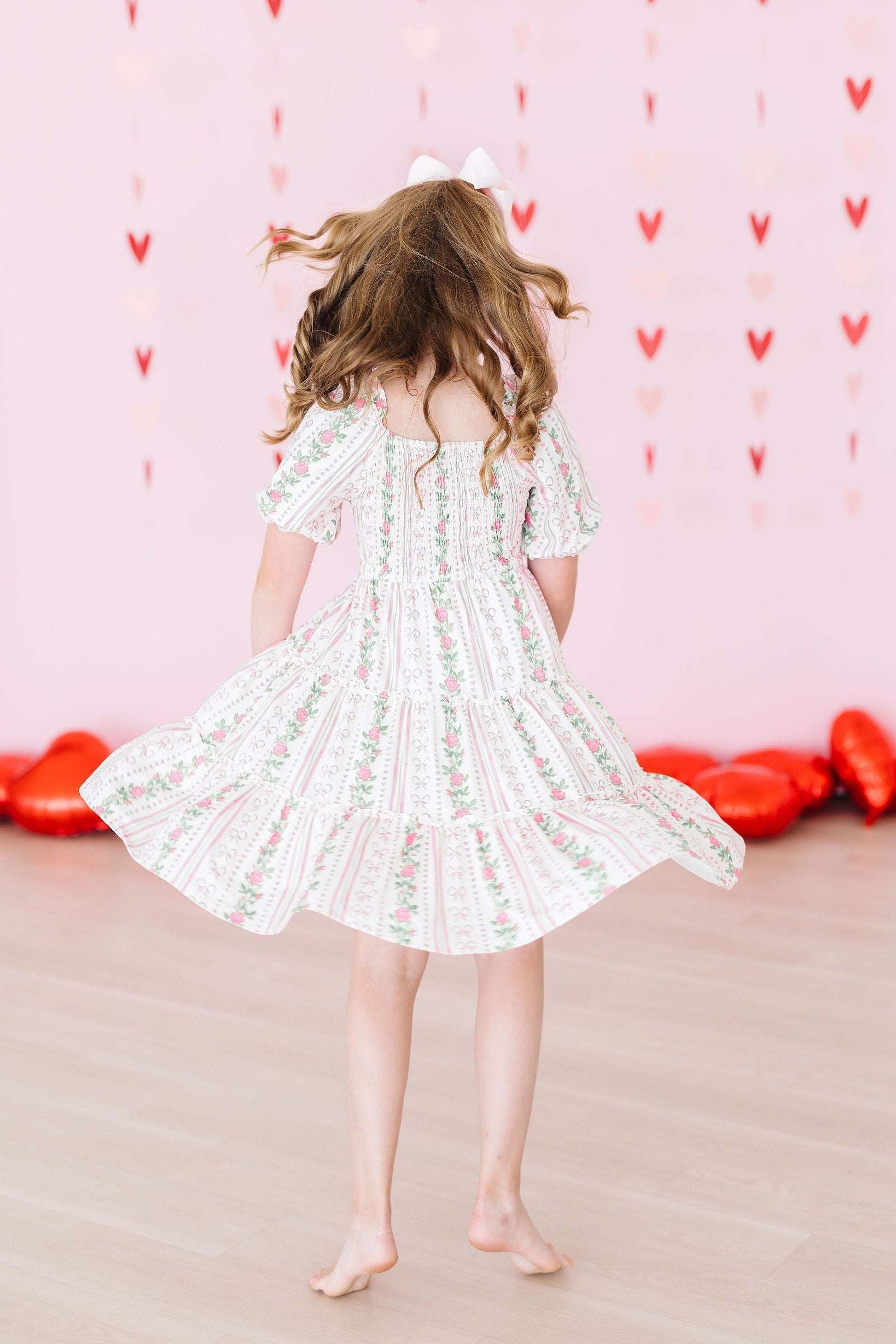 Rosebud Bows Smocked Ruffle Dress side view