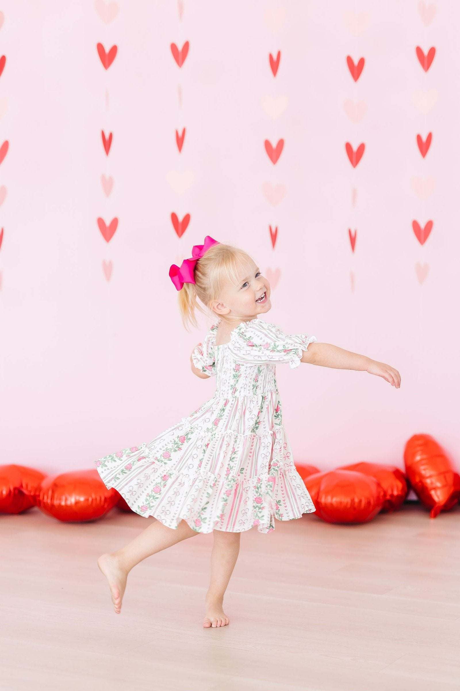 Rosebud Bows Smocked Ruffle Dress styling detail