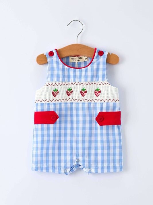 Blue checkered baby romper with red accents on a white background