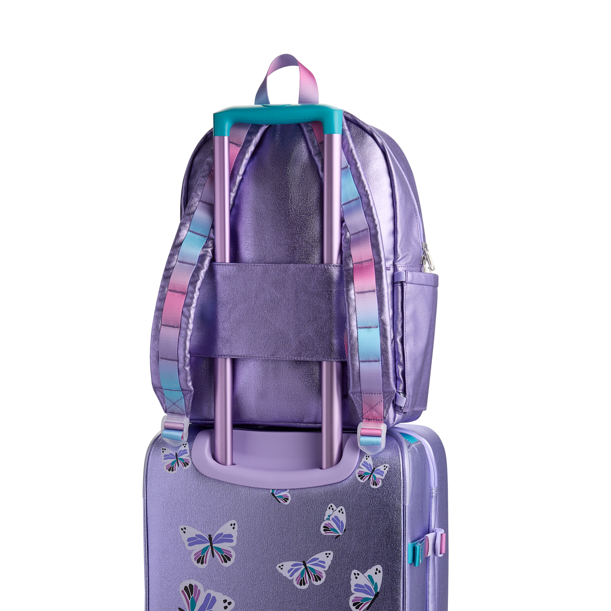 Logan Carry-On Suitcase in Butterfly, styled with child traveler