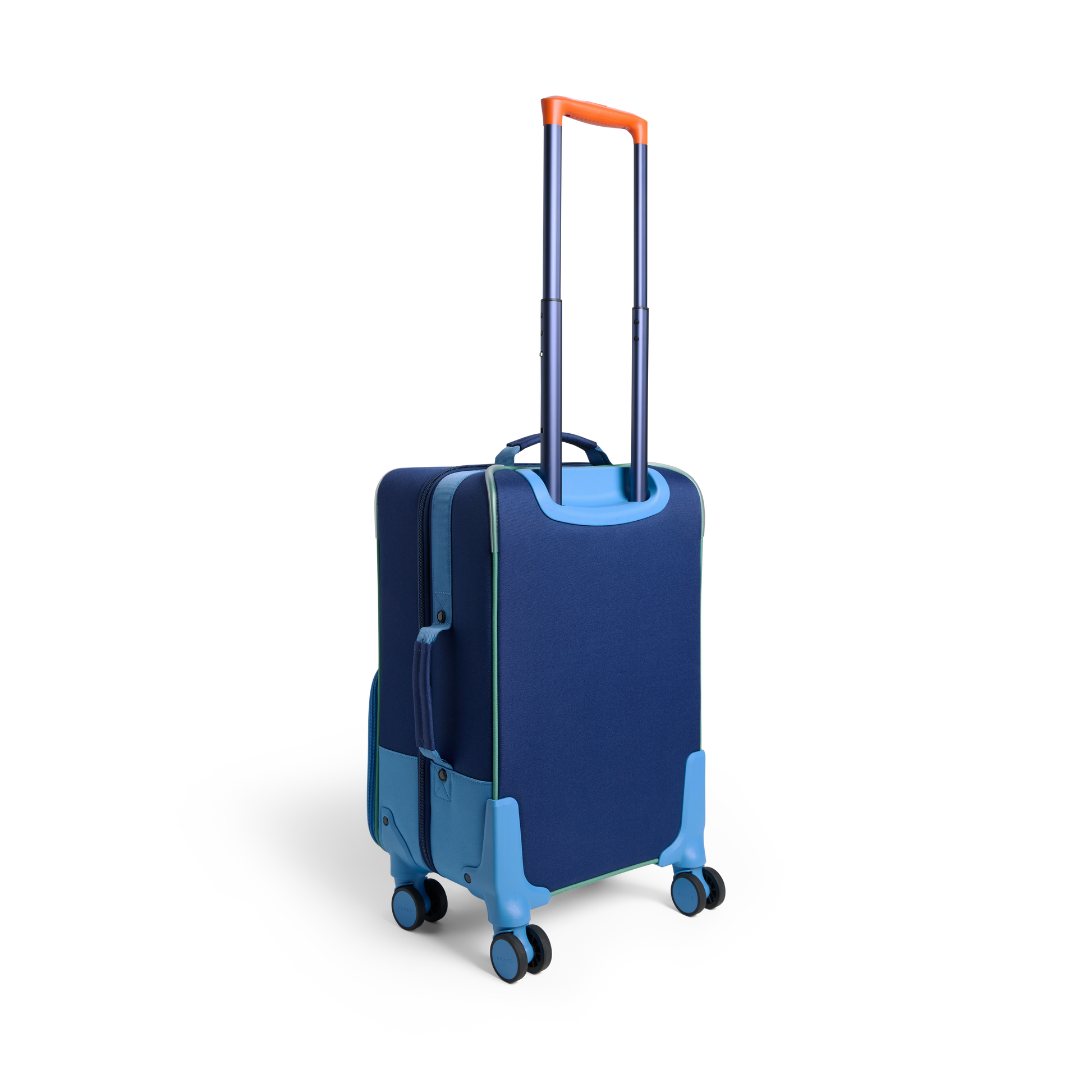 Logan Carry-On Suitcase in Green/Blue/Orange, styled with child traveler