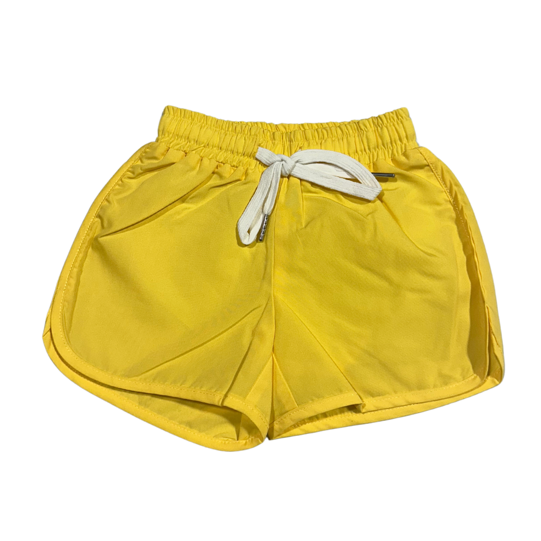Yellow athletic kid shorts with elastic waistband and white drawstring for comfort and style