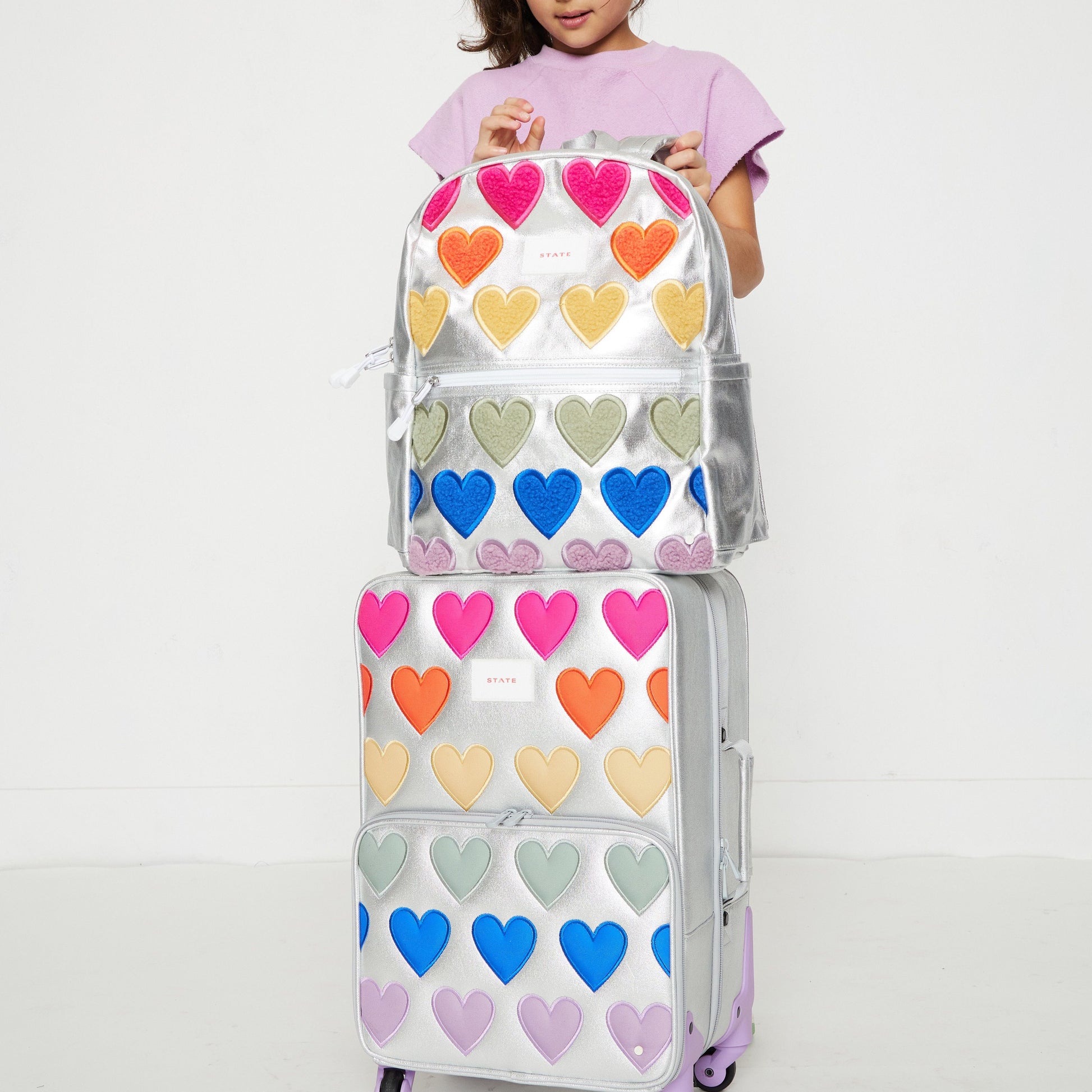 Logan Carry-On Suitcase in Patchwork Hearts, back view
