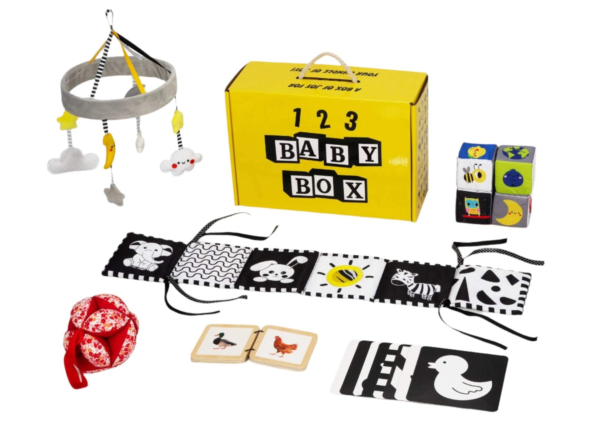 Montessori Educational Box for 0-2 months with sensory mobile, black and white cards, soft grip ball, fabric blocks, wooden book, and bed surround in yellow baby box