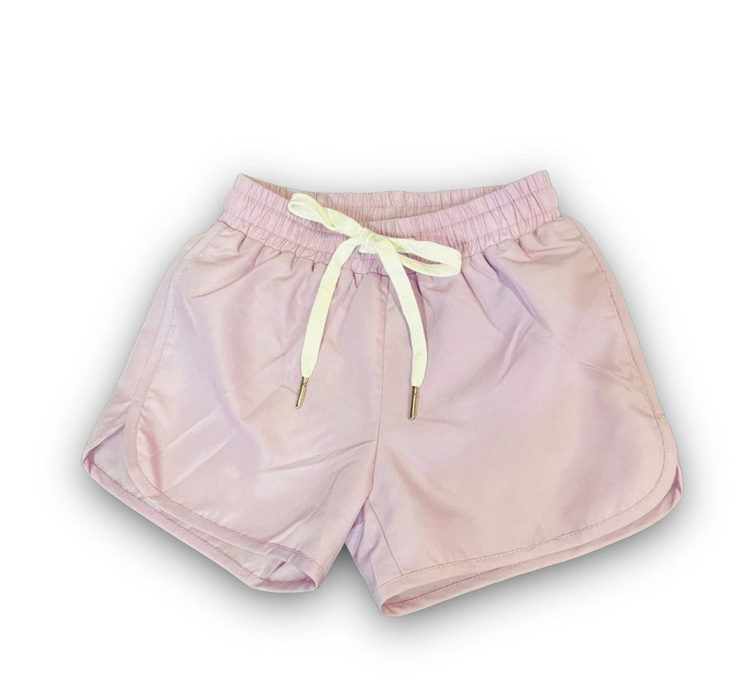 Light purple athletic kid shorts with elastic waistband and white drawstring for comfort and style