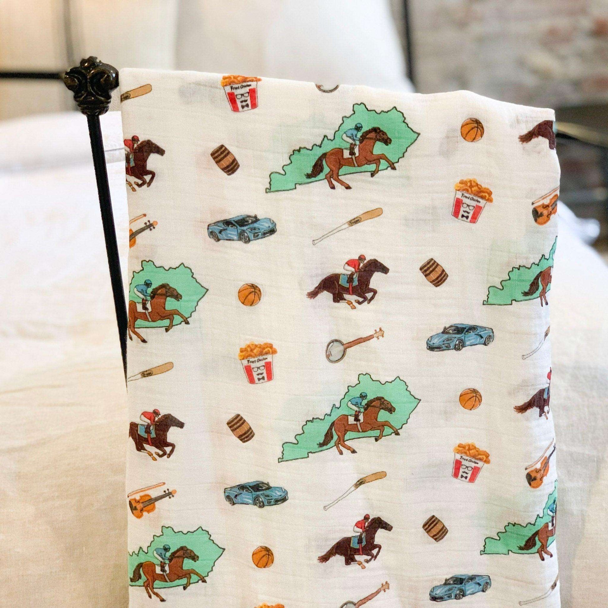 Gift Set: Kentucky Baby Muslin Swaddle Blanket and Burp Cloth/Bib Combo styling detail