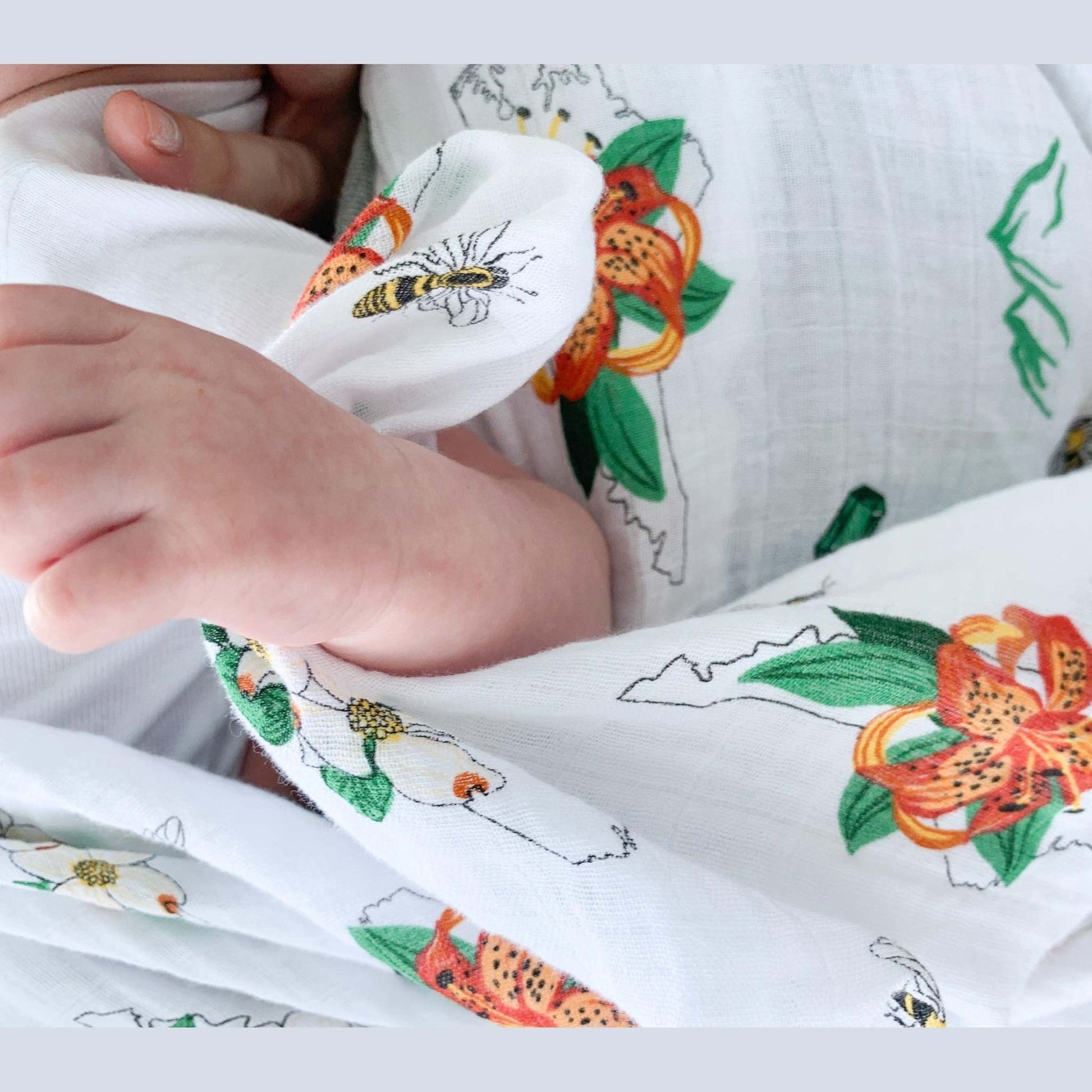 Gift Set: North Carolina Baby Muslin Swaddle Blanket and Burp Cloth/Bib Combo (Floral) styling detail