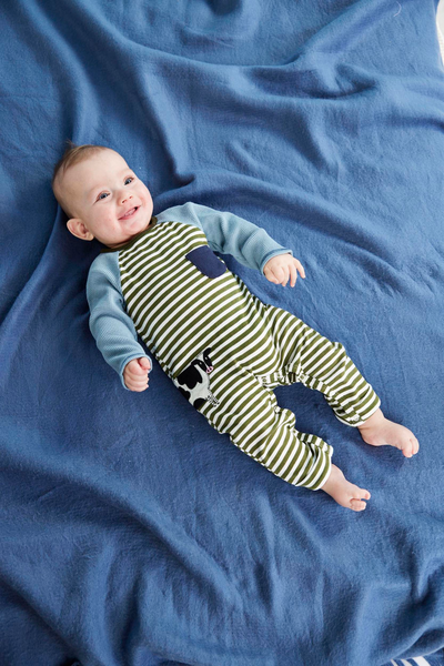 Cow striped baby bodysuit detail view