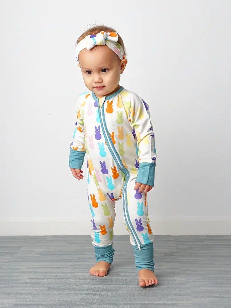 Easter Bunny bamboo baby pajamas with colorful peep print, footie style, and matching headband.